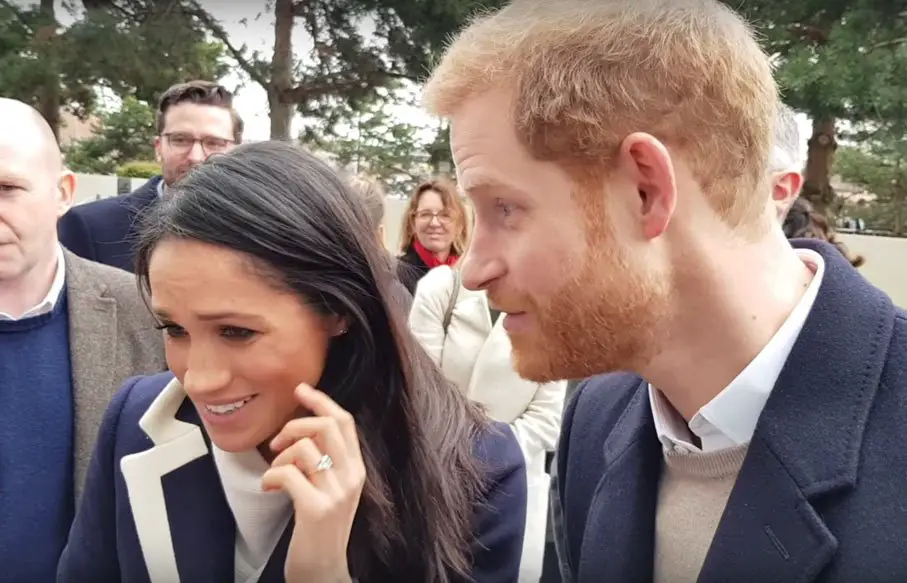 Meghan Markle showed off her reported $500,000 wedding ring as she was pictured with husband Prince Harry! © The MEGA Agency