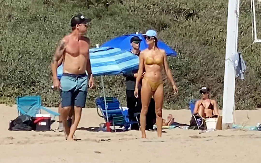 Alessandra Ambrosio showed off her trim figure is a gold nude bikini © The MEGA Agency