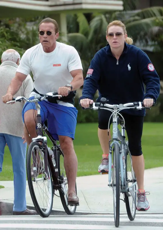 Arnold Schwarzenegger and Heather Milligan enjoy a bike ride together in LA © Atlantic Images