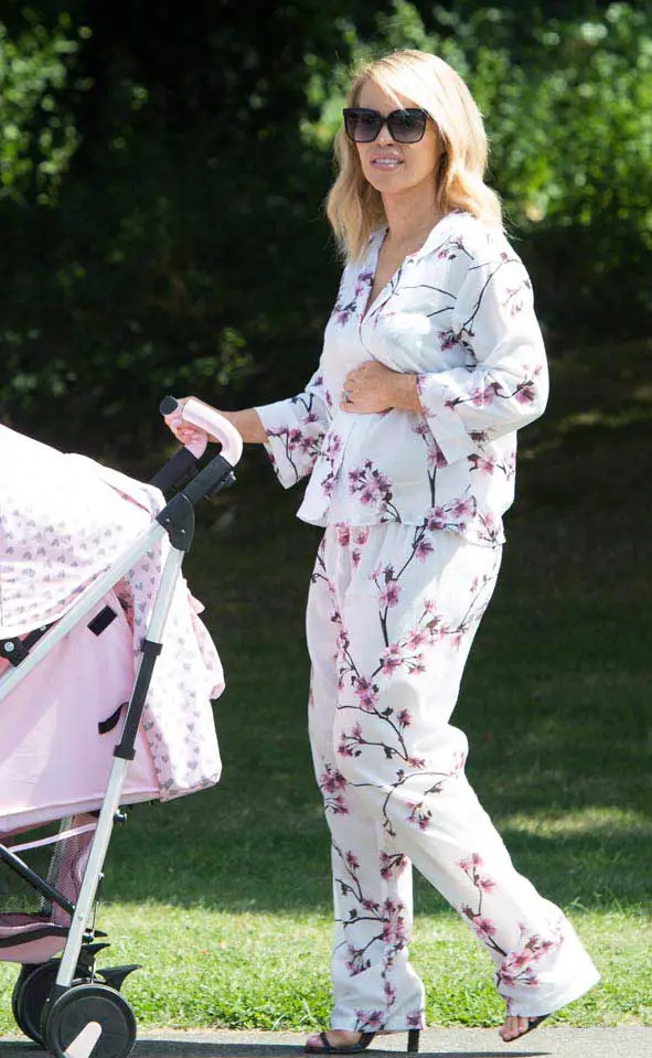 Katie Piper flashed a smile as she pushed her stroller.