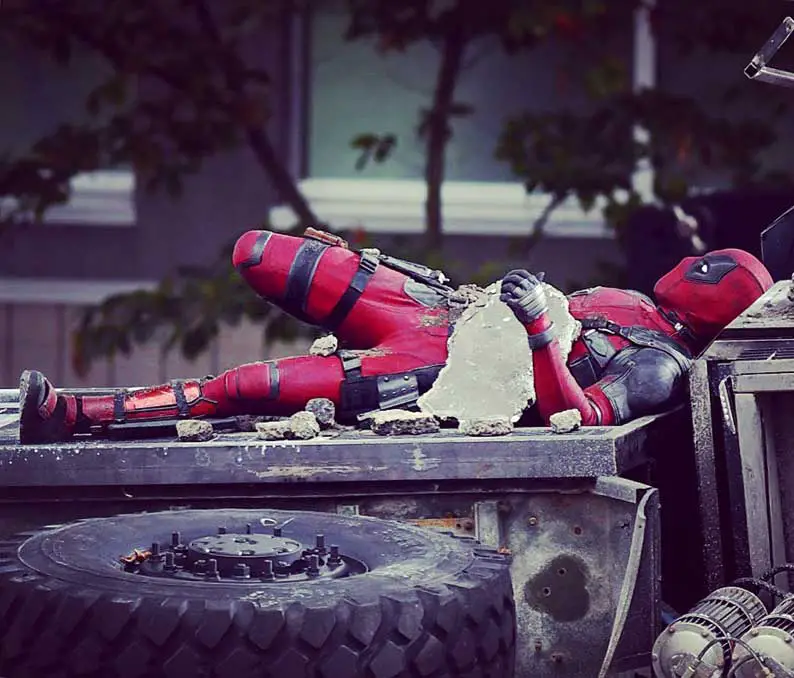 Deadpool up to more mischief on set of Deadpool 2 but pictured lying under some concrete
