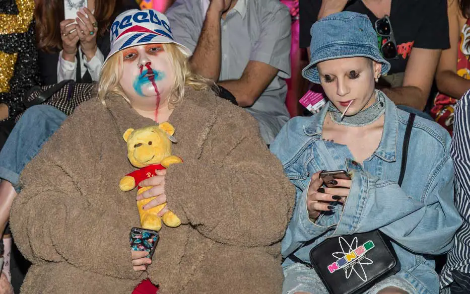 This Front Row couple turned heads with their statement outfits including a bloody nose, fake eyes, a Kenzo handbag, a vintage Reebok hat and even Winnie the Pooh! Mercedes Benz Fashion Week Madrid - Photo Courtesy of Image.net / Atlantic Images