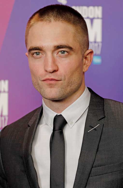 Robert Pattinson sparked comments on Social Media with his new short hair skinhead haircut at the Good Time premiere