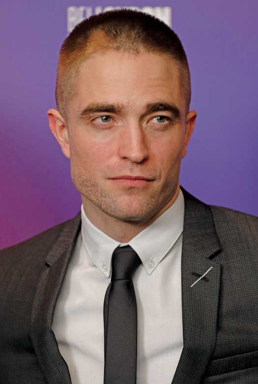 Robert Pattinson sparked comments on Social Media with his new short hair skinhead haircut at the Good Time premiere
