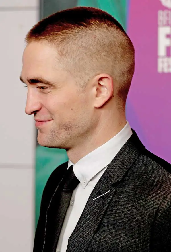 Robert Pattinson sparked comments on Social Media with his new short hair skinhead haircut at the Good Time premiere