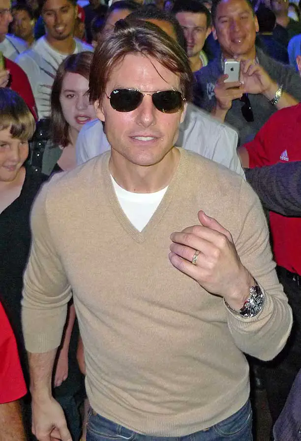Tom Cruise stepped out in a smart v-neck and Ray-Ban aviator sunglasses at an LA Galaxy game