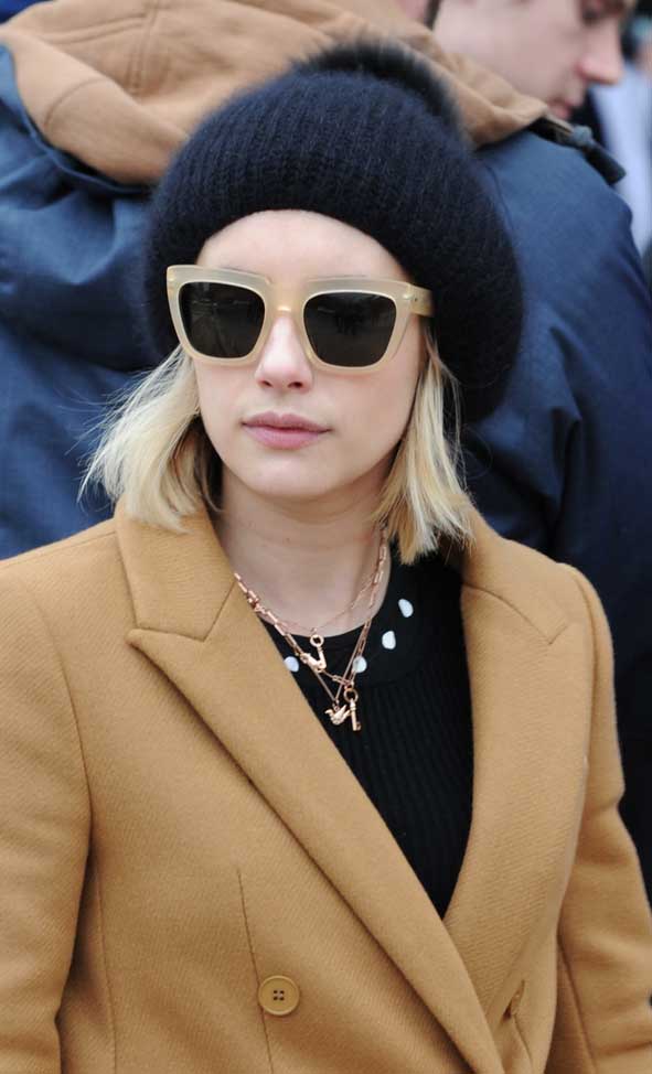 Emma Roberts showed off her gold necklace which had several keys attached