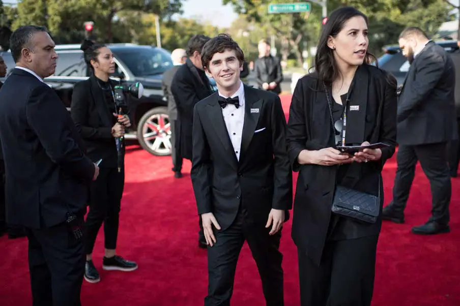 Freddie Highmore from The Good Doctor also showed his support for the equality movement wearing his “Times Up” badge to the Globes © HFPA