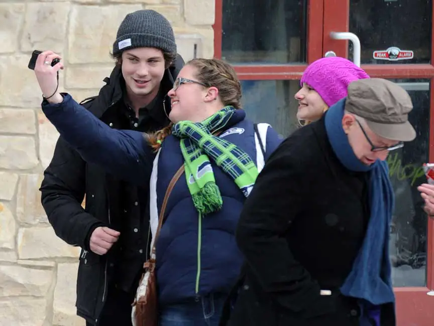 Logan looked in great spirits and even stopped to pose for some selfies with some fans © Atlantic Images