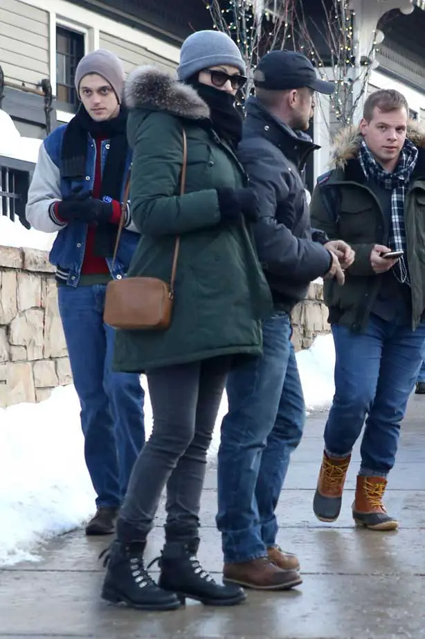 Watch the ice! Laura wore some big black leather winter boots as she navigated the icy streets