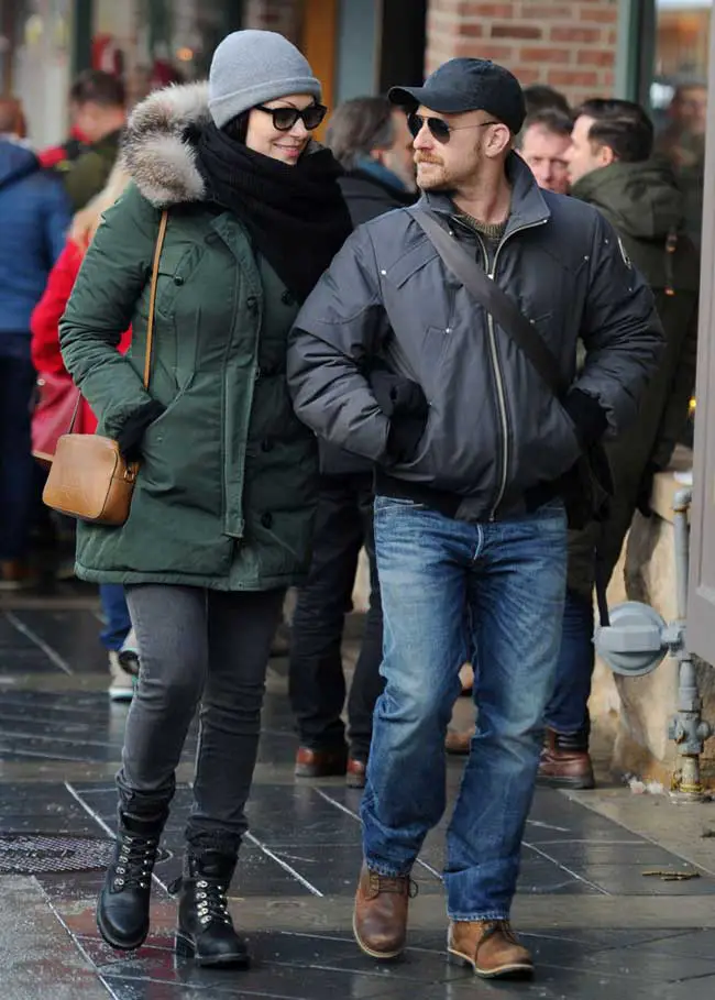 Ben Foster Wears a baseball cap and winter jacket while Laura Prepon covered up in a back scarf and beanie