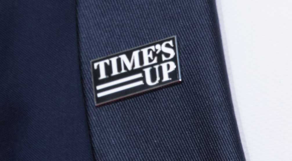 Times Up! “Times Up” is a movement to combat sexual harassment in the workplace and was a "unified call for change from women in entertainment for women everywhere" © HFPA
