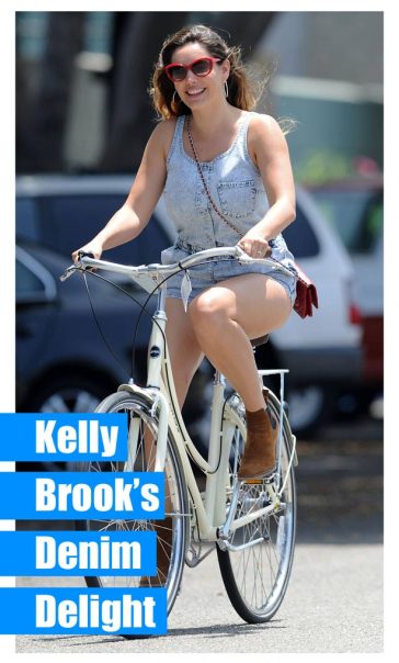 Kelly Brook Revealing Denim One Piece Showing Off Legs British model cycling on Linus Bicycle in Santa Monica Los Angeles