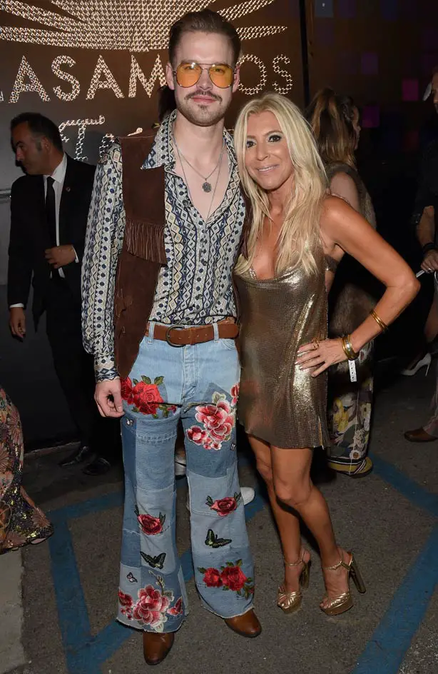 70's style! Chord Overstreet was pictured with fashion expert and tv producer Rachel Zalis at George Clooney's Casamigos Tequila Halloween Party - Photos courtesy of Image.net / Michael Kovac / Getty Images for Casamigos Tequila couple Emma Watson boyfriend