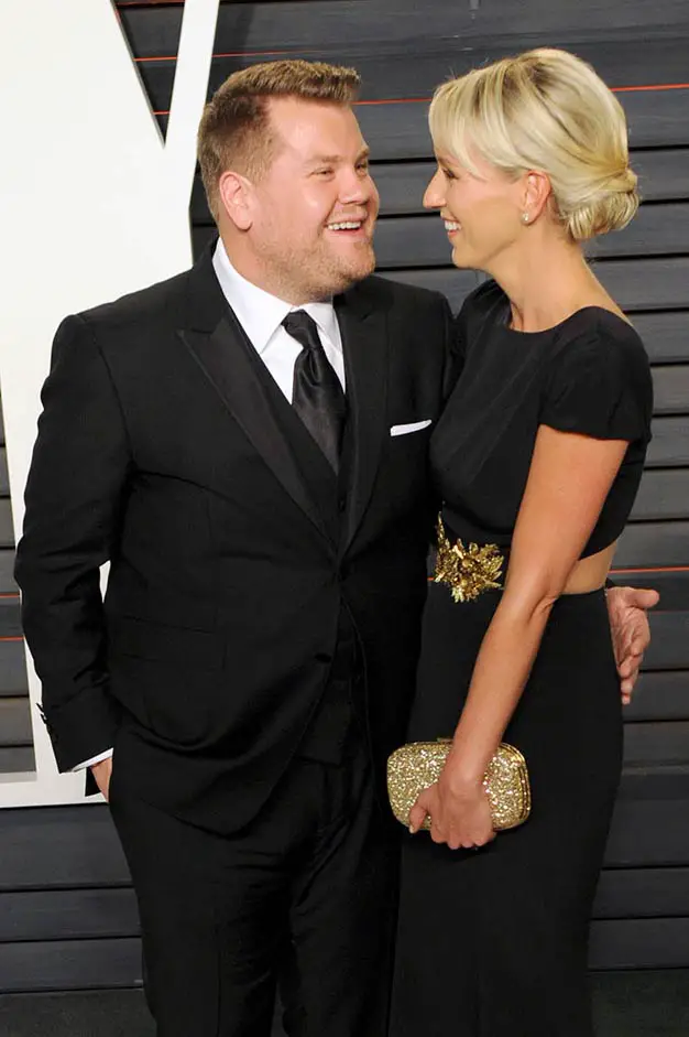 James Corden shared a joke with wife Julia Carey in a matching black tuxedo and dress