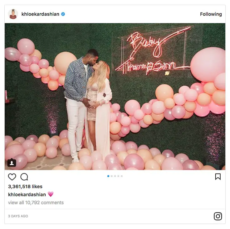 Khloe Kardashian in night gown lingerie kissing partner Tristan Thompson