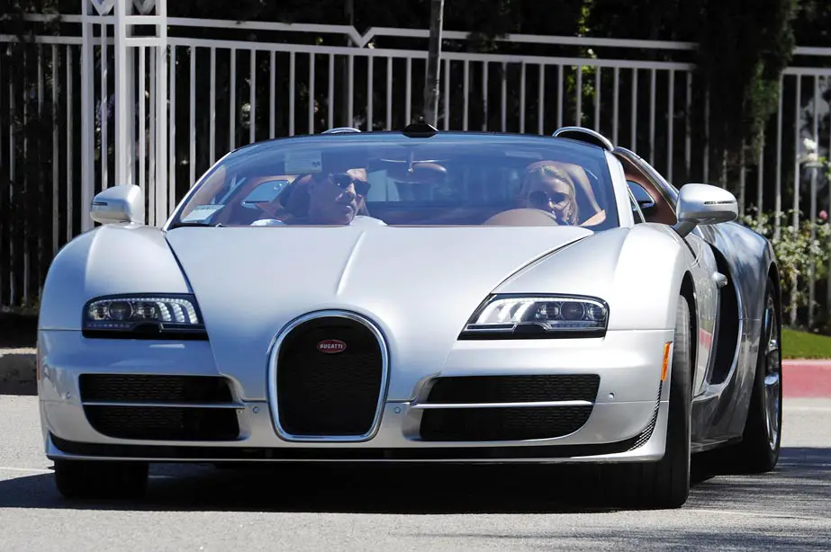 Arnold Schwarzenegger Open Heart surgery Arnold Schwarzenegger let girlfriend Heather Milligan drive his Bugatti sports car!