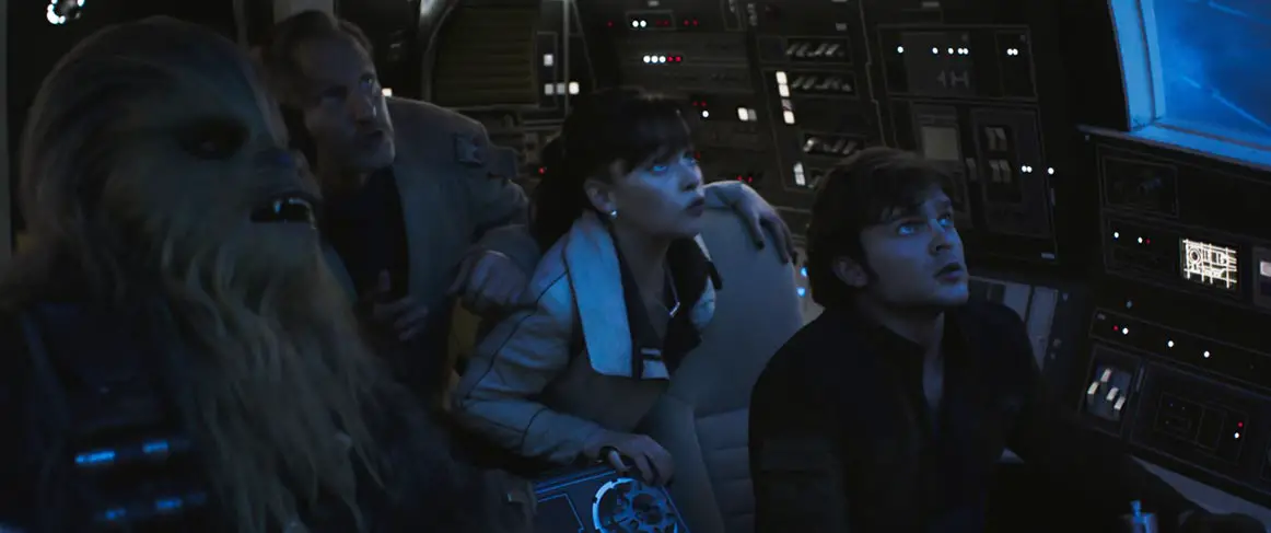 Solo: A Star Wars Story Stills Chewbacca, Tobias Beckett, Qi-ra and Han Solo all aboard the Millennium Falcon