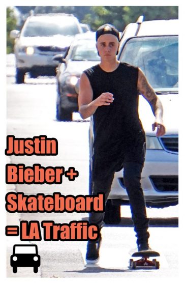 Justin Bieber Skateboarding in Los Angeles Showing off Tattoos wearing a baseball cap at the Sant Monica Think It Up event