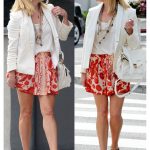 Reese Witherspoon showed off her Parisian style with a canvas necklace and red and orange patterned skirt © Atlantic Images