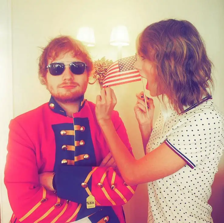 Taylor Swift posted “When Ed shows up in a red coat for 4th of July because he just can’t let it go. I’m dying." - Photo courtesy of Taylor Swift / Twitter