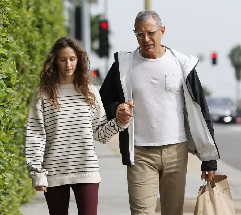 Jeff Goldblum holds hands with his wife Emilie Livingston who was an Olympic gymnast