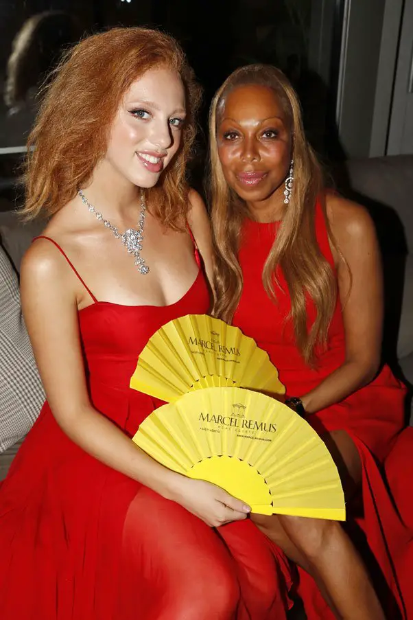 Boris Becker's daughter Anna Ermakova and her mom, Angela Ermakova wore matching red dresses to the event - Photo by Franziska Krug / Getty Images for Marcel Remus / Image.net