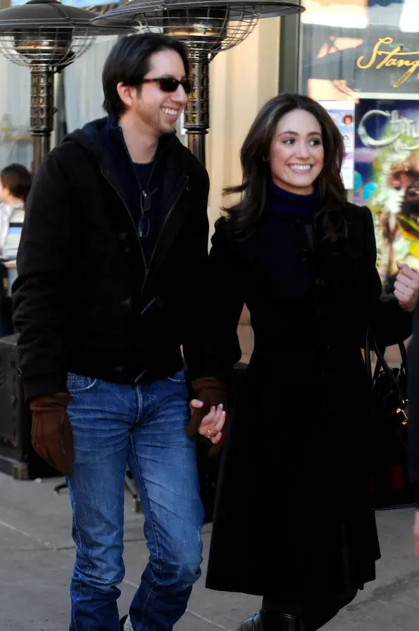 Emmy Rossum and her then-husband Justin Siegel. She remarried in 2017