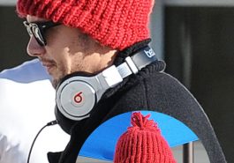 Nice Hat! James Franco wore a bright red bobble hat and Beats headphones in Santa Monica © Atlantic Images