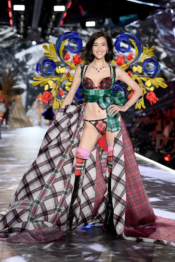 VS Angel Liu in Victoria’s Secret Very Sexy Push-up Clash Front-close Strappy Bra & Very Sexy Clash String Bikini Printed Tartan Silk Skirt and Feathered Wing - Photo courtesy of Victorias Secret Media Room by Dimitrios Kambouris / Getty Images