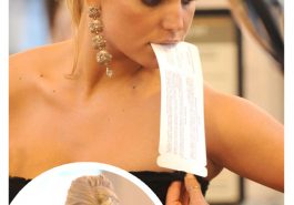 Jessica Simpson showed off her cleavage in a strapless dress as she held her plane ticket in her mouth! © Atlantic Images