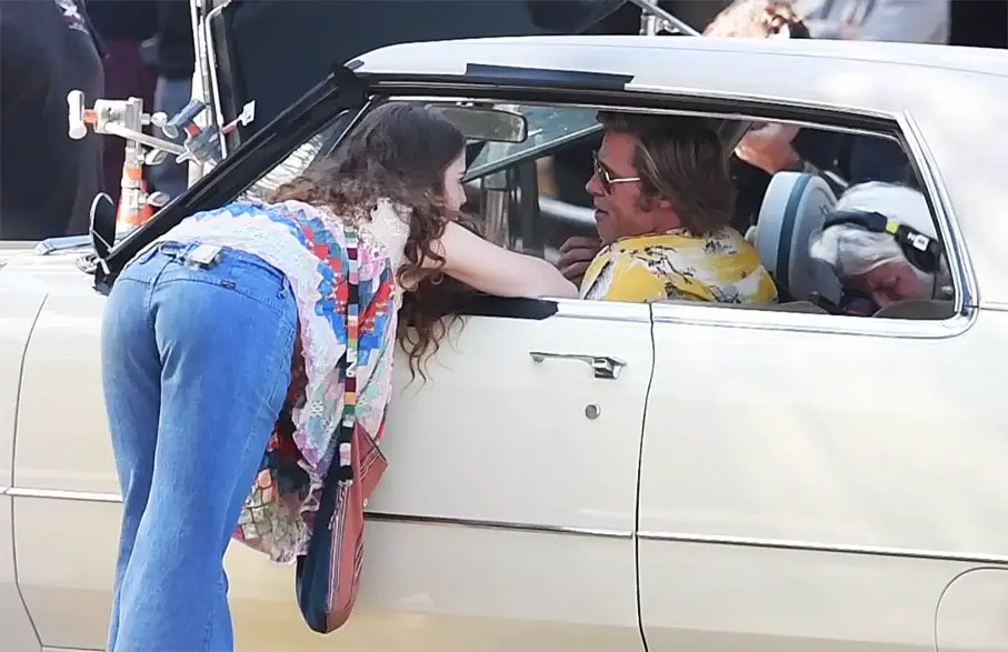 Brad Pitt chats to Margaret Qualley filming Once Upon A Time In Hollywood on Burbank Blvd © The MEGA Agency