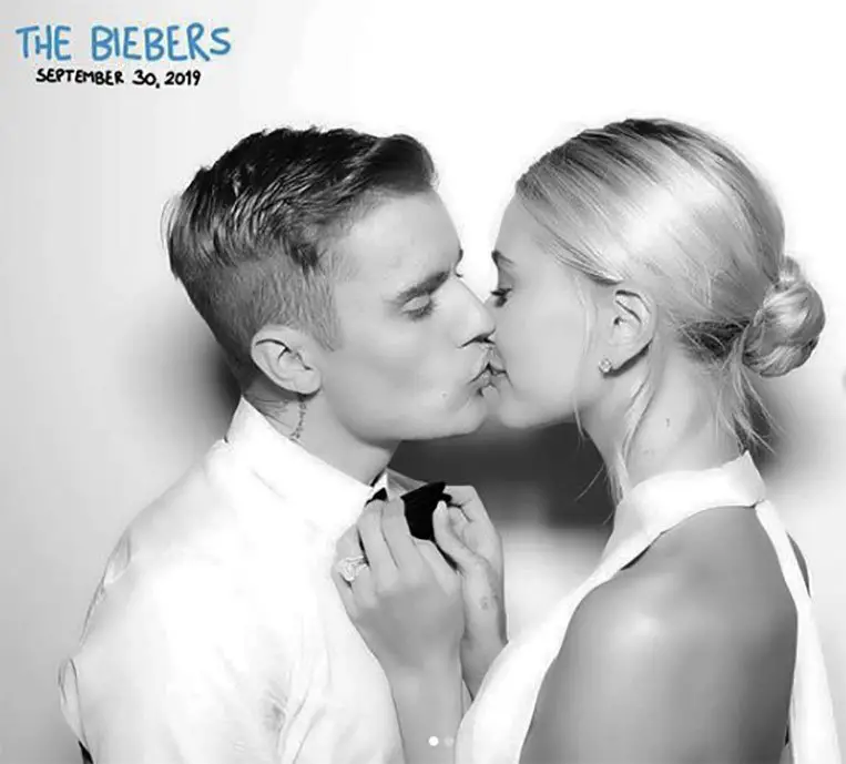 Give us a kiss! "The Biebers" sealed their vows with a kiss in this official pic posted on Justin Bieber's social media - Photo courtesy of @justinbieber / Instagram