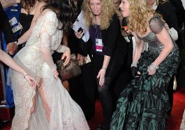 Madonna couldn't help but see the funny side of stepping on Jessica Biel's dress! © Atlantic Images