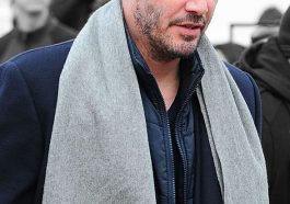 Keanu Reeves looked dapper in his grey scarf and smart winter jacket © Atlantic Images