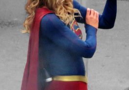 Melissa Benoist flexes her muscles as she grabbed on to her bicep filming the CW Supergirl show in Vancouver