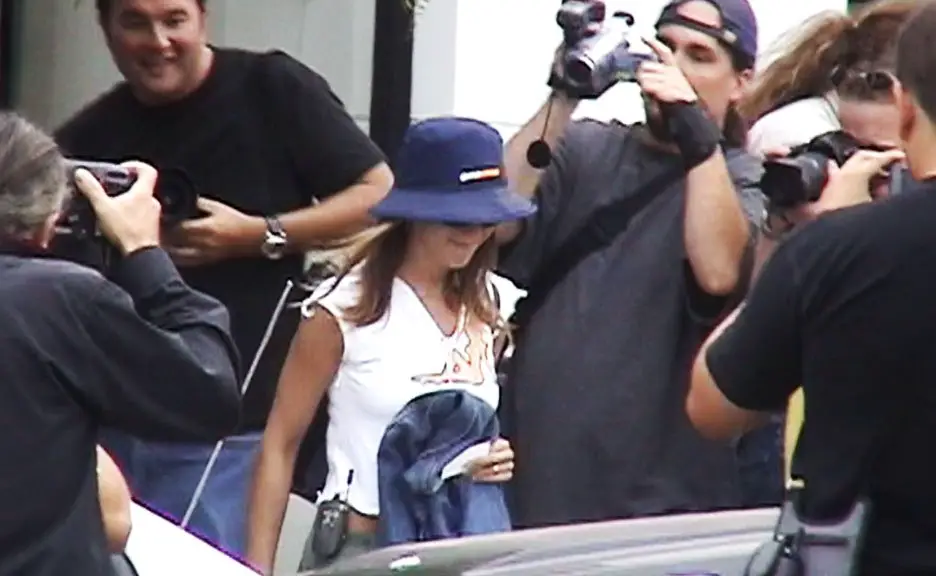 Jennifer Aniston rocked a bucket hat and an old school flip phone clipped to her belt as she left a store in Beverly Hills