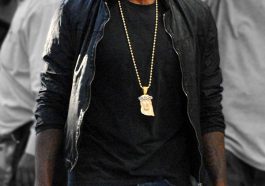 Kanye fashioned a Jesus Gold chain as he arrived to watch the LA Lakers in Downton Los Angeles