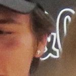 Son of superstar signing autographs at photographic book launch with crucifix earring © Atlantic Images Brooklyn Beckham Brooklyn Nets Cap What I See Book Signing © Atlantic Images