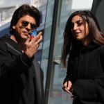 One lucky female fan managed to stop Shah Rukh Khan in Vancouver, Canada and take a picture for her © Atlantic Images Shah Rukh Khan Sunglasses Hoody Coat Selfie Female Fan Vancouver © Atlantic Images