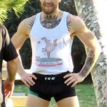 Conor McGregor takes a break from training smiling in his fun Venice Beach vest with a Californian dancing bear on! © Atlantic Images Conor McGregor Smiling Venice Beach Vest Dancing Bear