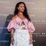 Rihanna hit a red carpet in Madrid, Spain wearing an off-the-shoulder cleavage-baring dress by Ukrainian designer Marianna Senchina - Photos courtesy of Sephora / Image.net / Atlantic Images Rihanna Fenty Beauty Launch Tattoos Cleavage Marianna Senchina Dress Madrid Spain Olgana Paris shoes Chopard jewelry
