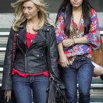 Alyson Michalka and Vanessa Hudgens both carried their own bags as the pair left a hotel in Los Angeles © Atlantic Images Alyson Michalka Vanessa Hudgens Bandslam Costars