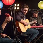 Niall Horan surprised the children from the Young Carers project in Kingston to the most exclusive gig in town as he performed his new single Too Much To Ask - Picture by Guy Levy © BBC Niall Horan Performing Children In Need Earpiece Haircut Checked shirt Pudsey Stage Guitar